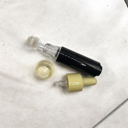 Black Roller with Hyaluronic Acid Essence - Skin Care Tools Online